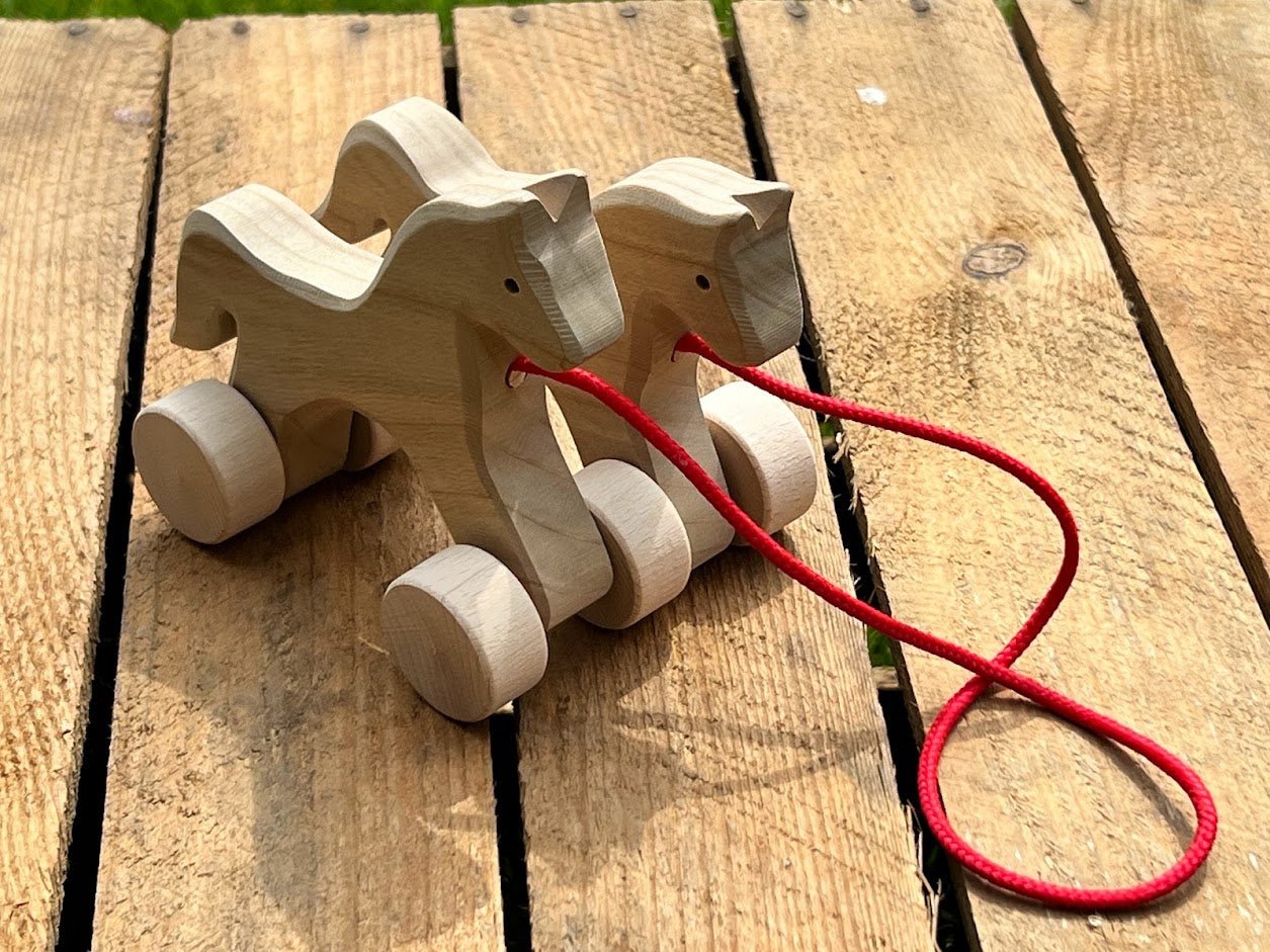 Double cheval à roulette en bois à tirer - La Cabane à Loulous